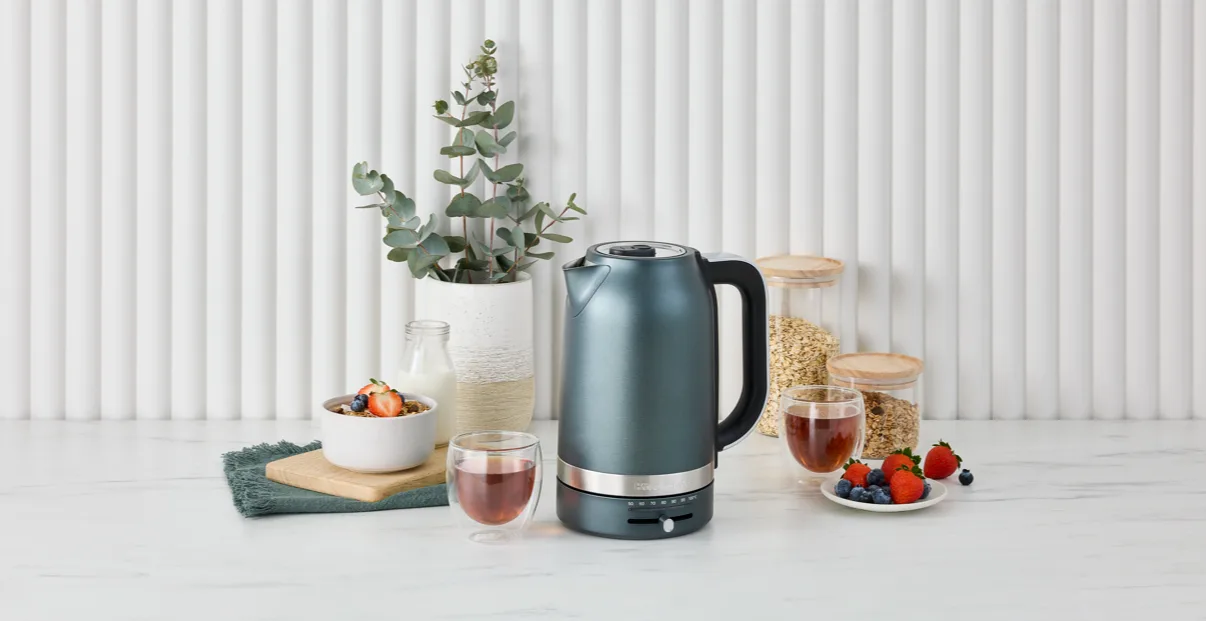 Lifestyle image of a KitchenAid kettle surrounded by breakfast foods