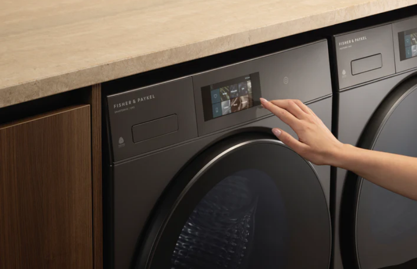 Close up image of a Fisher & Paykel Auto Dosing washing machine.