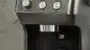 A breville coffee grinder in a modern home