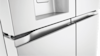 Close up image of the LG Essence Matte White French Door Fridge.