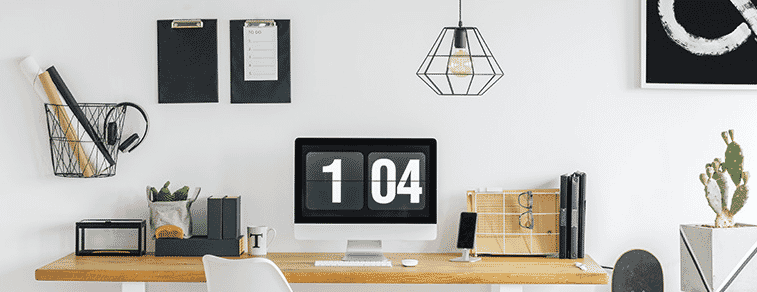 Closeup of a well organised desk in a home office with a slick personal computer