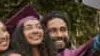 Family taking a group selfie with their Chromebook at their daughters graduation.