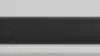 Close up of sleek LG soundbar underneath TV.