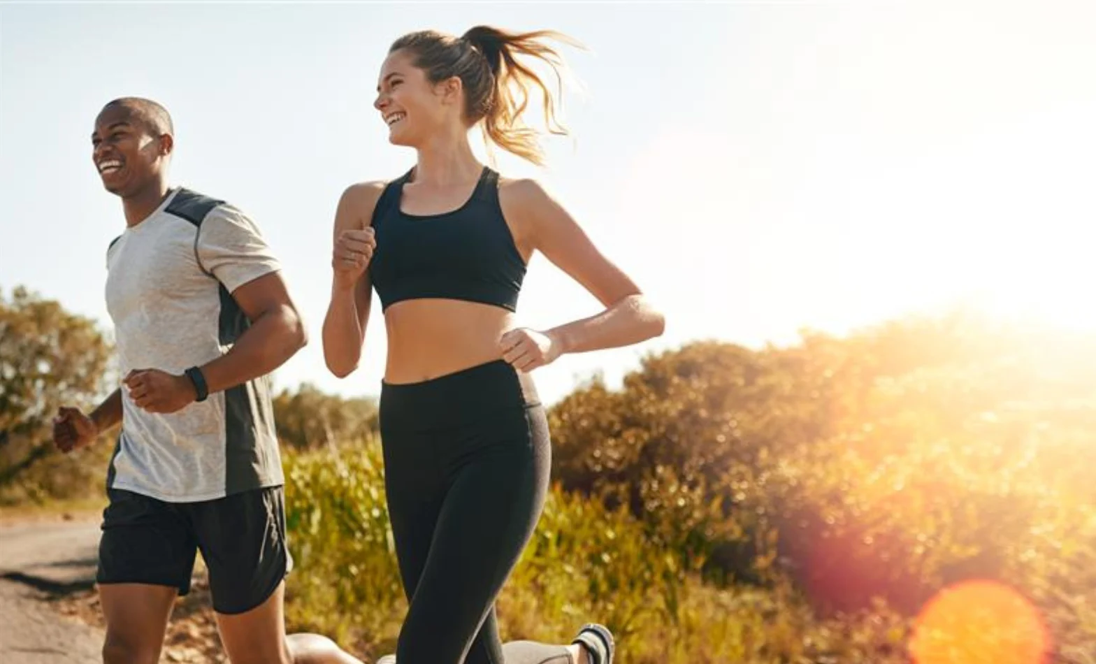 Couple running outdoors
