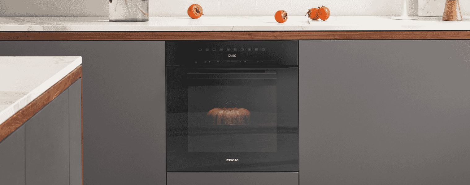 The Miele 60cm Pyrolytic Oven sits in a grey kitchen