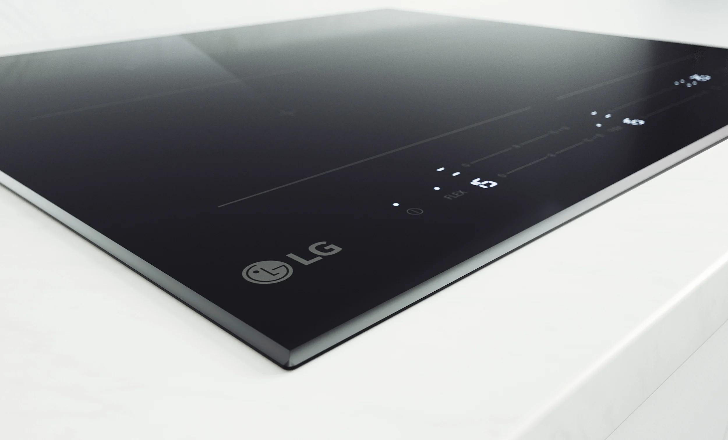 Close-up image of an LG induction cooktop