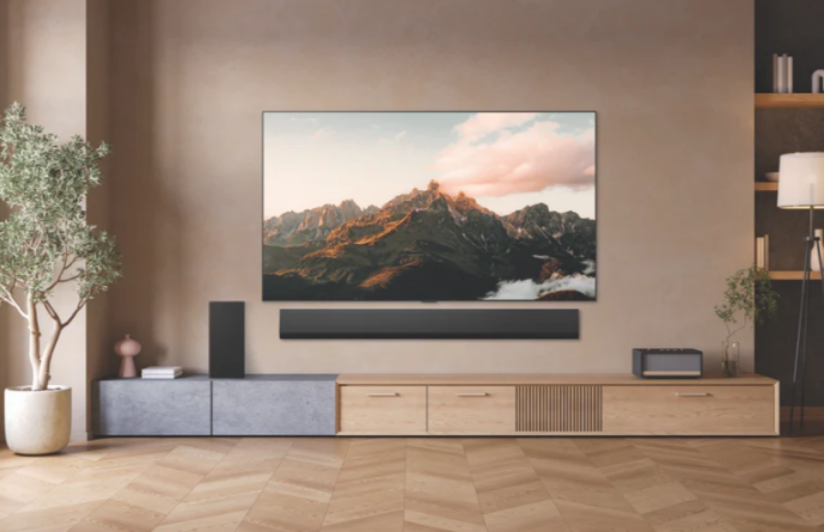 LG UHD TV with mountains on screen.