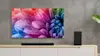 LG UHD TV with flowers on screen.