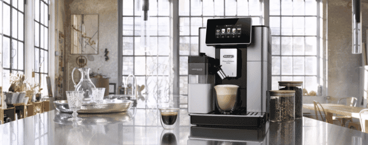 A sleek black and silver coffee machine in a industrial apartment