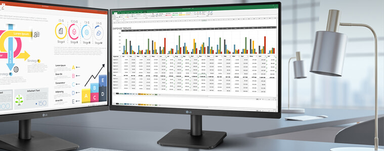 Two LG monitors sit side by side in an office space
