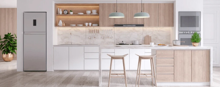 A bright white kitchen with silver appliances