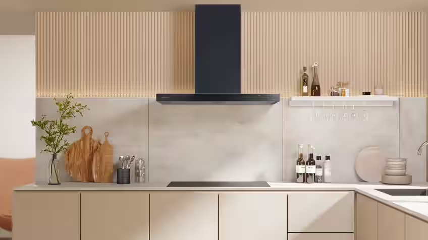 Chic matte black rangehood in stylish kitchen