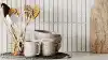 Lifestyle image of a modern kitchen featuring a Westinghouse quad door fridge.