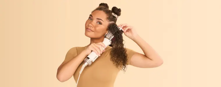 woman using Shark SmoothStyle