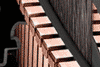 Close up of flexing plates of a Dyson straightener.