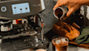 the barista touch impress being used to create cold brew coffee