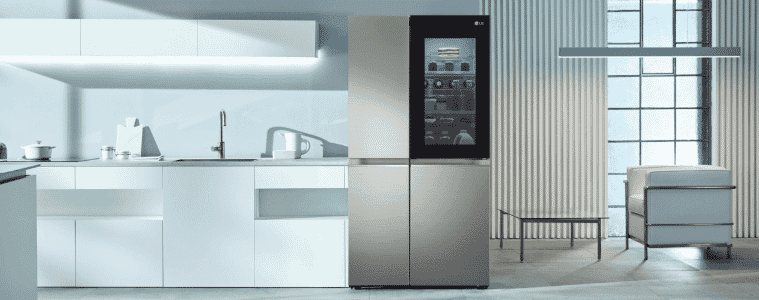 A silver LG French door fridge with a clear window sits in a white kitchen