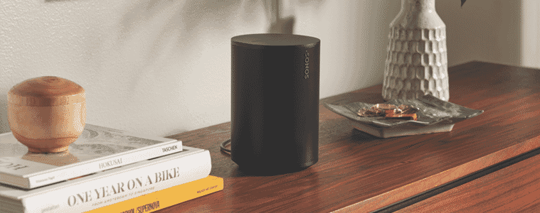 A portable Sonos speaker sits on a console