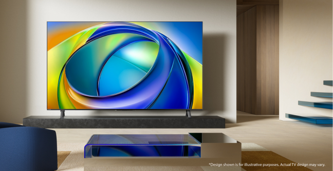 A Toshiba TV is mounted on the wall of a modern living room