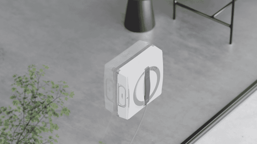 Close up of ECOVACS window cleaner on a window