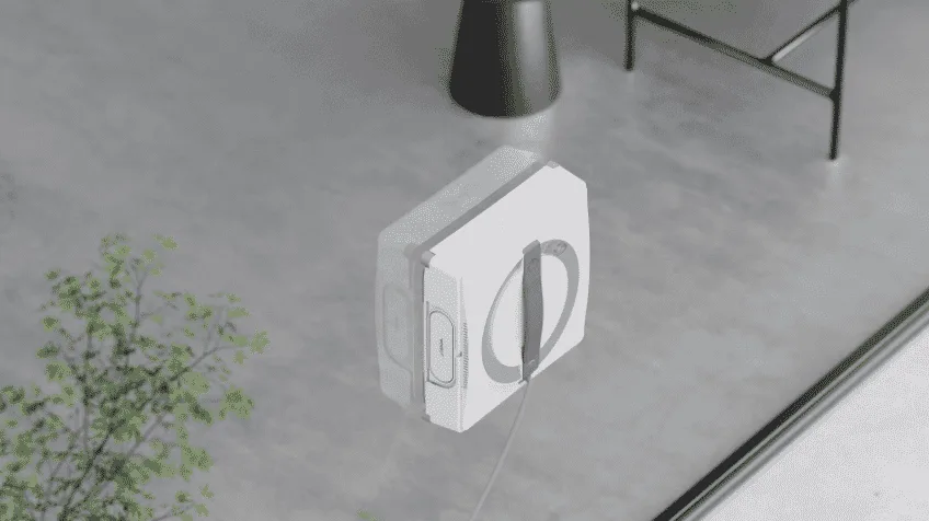 Close up of ECOVACS window cleaner on a window