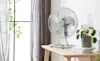 A Dimplex fan sits on a desk in a bright and airy room