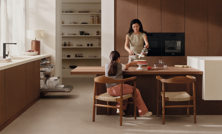family cooking in Miele kitchen