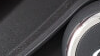 A close up of the two control dials on a Weber BBQ