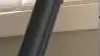 Close up of Samsung AI vacuum in living room.
