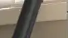 Close up of Samsung AI vacuum in living room.