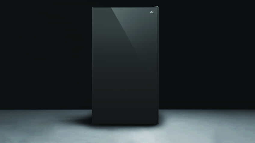 black Solt fridge on grey floor with black background