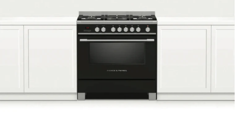 Black Fisher  Paykel freestanding oven in white kitchen