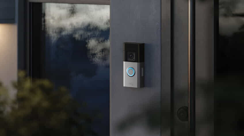 Stylish and compact Ring Video Doorbell on the wall of a front door