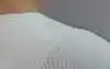 Image of hand knocking on the front of an LG InstaView Fridge door.