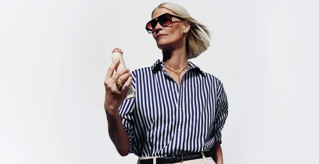 Image of a woman using the Dyson Hushjet Mini Cool (Stone/ Blush)