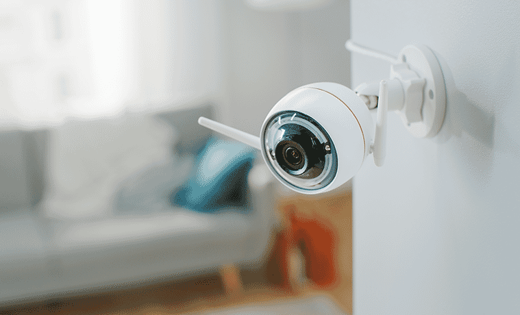 Close up shot of a wallmounted indoor security camera 