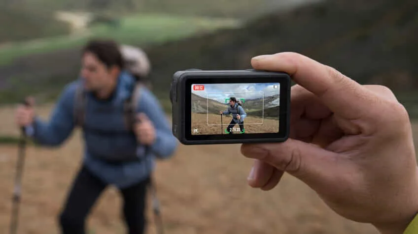 DJI osmo action 5 pro photographs man hiking