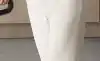 woman cleans floor with Dyson WashG1™ Wet Cleaner