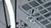 Image of the bottom drawer of the dishwasher showing how you can make extra room for large pots and pans.