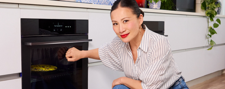 Image of Poh Ling Yeow using the knock knock function on an LG Steam Oven.