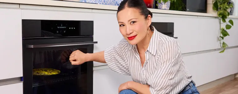 Image of Poh Ling Yeow using the knock knock function on an LG Steam Oven.