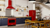 Red smeg Portofino range products including rangehood.