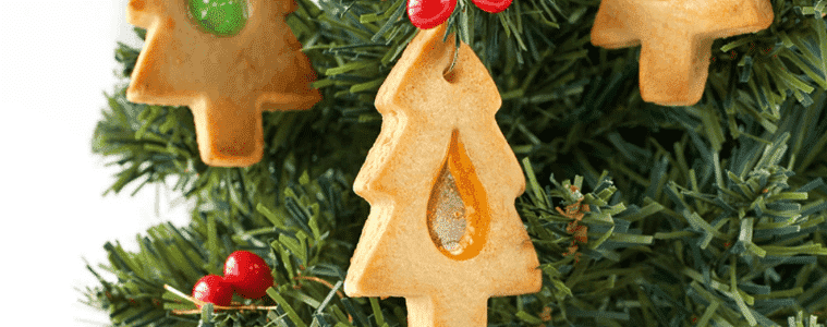 Stained Glass Christmas Biscuits hang from a Christmas tree