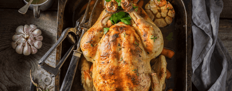 Roast Chicken on table ready to be shared for Easter Lunch