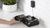 Hoover Onepwer Batteries charging on a modern benchtop
