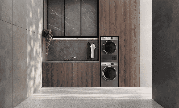 Fisher  Paykel Washer and Dryer stacked on top of each other in a laundry room