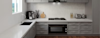 Lifestyle image of a kitchen with a De'Longhi Built In Oven