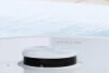 Ecovacs robot vacuum cleaning a lounge room