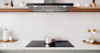 Lifestyle image of a pot cooking on a Westinghouse Induction Cooktop