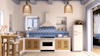 Stunning Smeg Portofino range is blue and white kitchen.